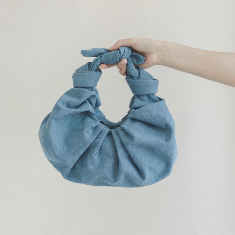A Bronze Age Denim Croissant Bag